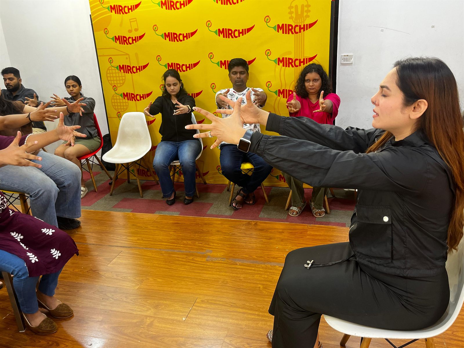 Vibha Jain leading a confidence-building group workshop